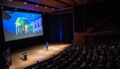 Ashleigh Axios speaking at the 3% Conference