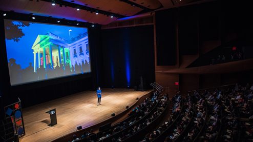 Ashleigh Axios speaking at the 3% Conference