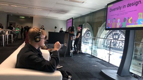 Eriol in front of the title slide 'Diversity in Design'