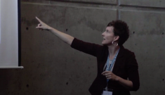 Melissa pointing to her slides